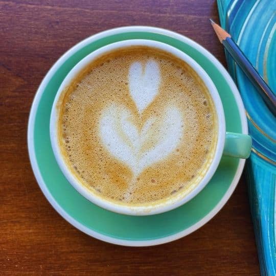 Cappuccino and mindful journaling moment for your digital detox